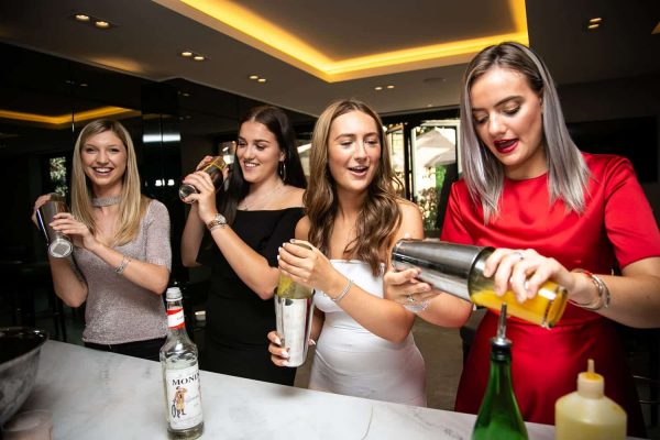 Friends toasting during a hen party celebration