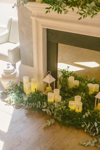 fireplace with candles